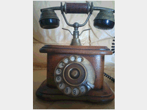 Telefono in legno a rotella stile antico